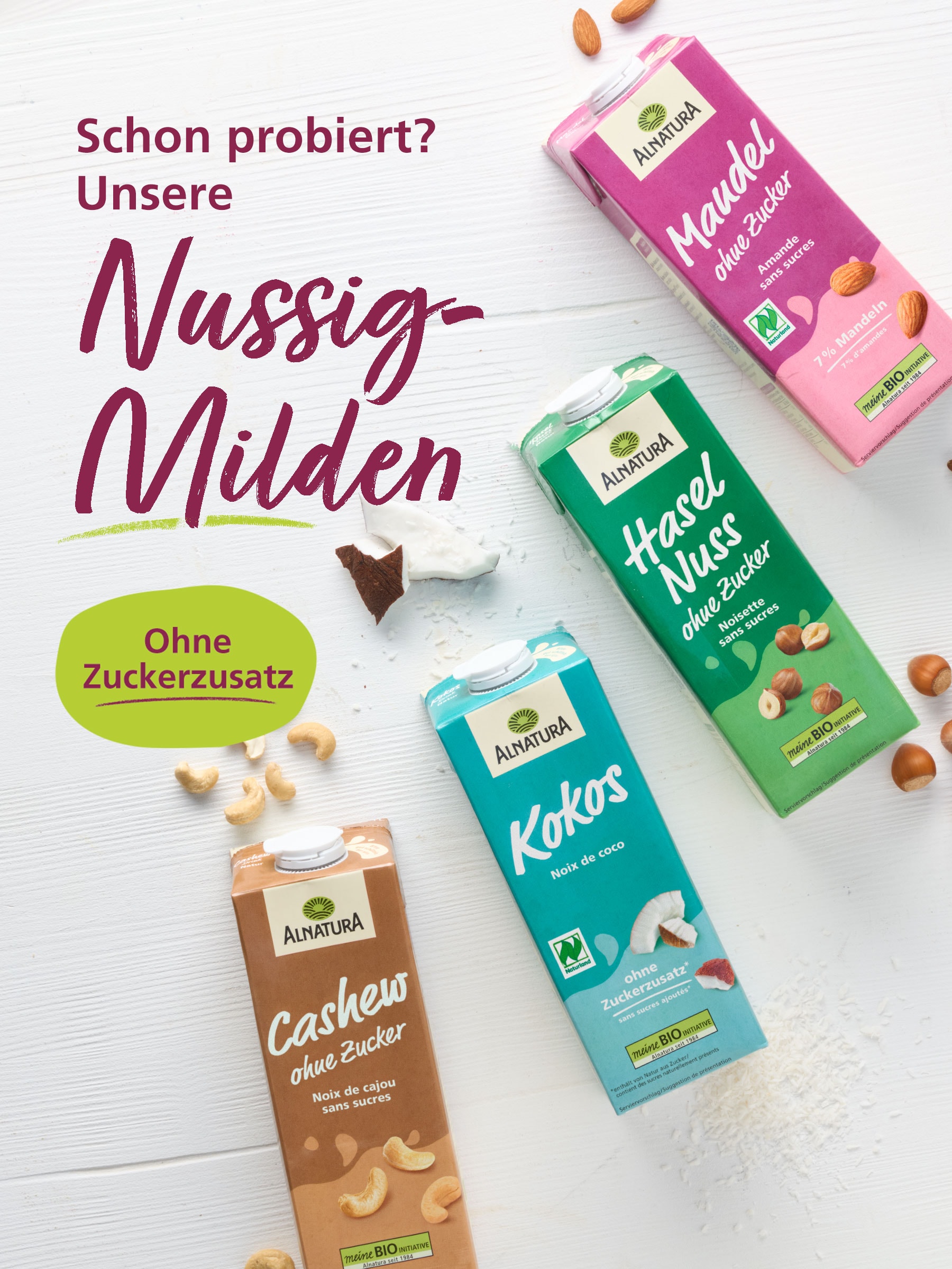 Vier Alnatura Bio-Milchersatzprodukte: Cashew-Drink, Kokos-Drink, Haselnuss-Drink und Mandeldrink auf hellem Hintergrund. 