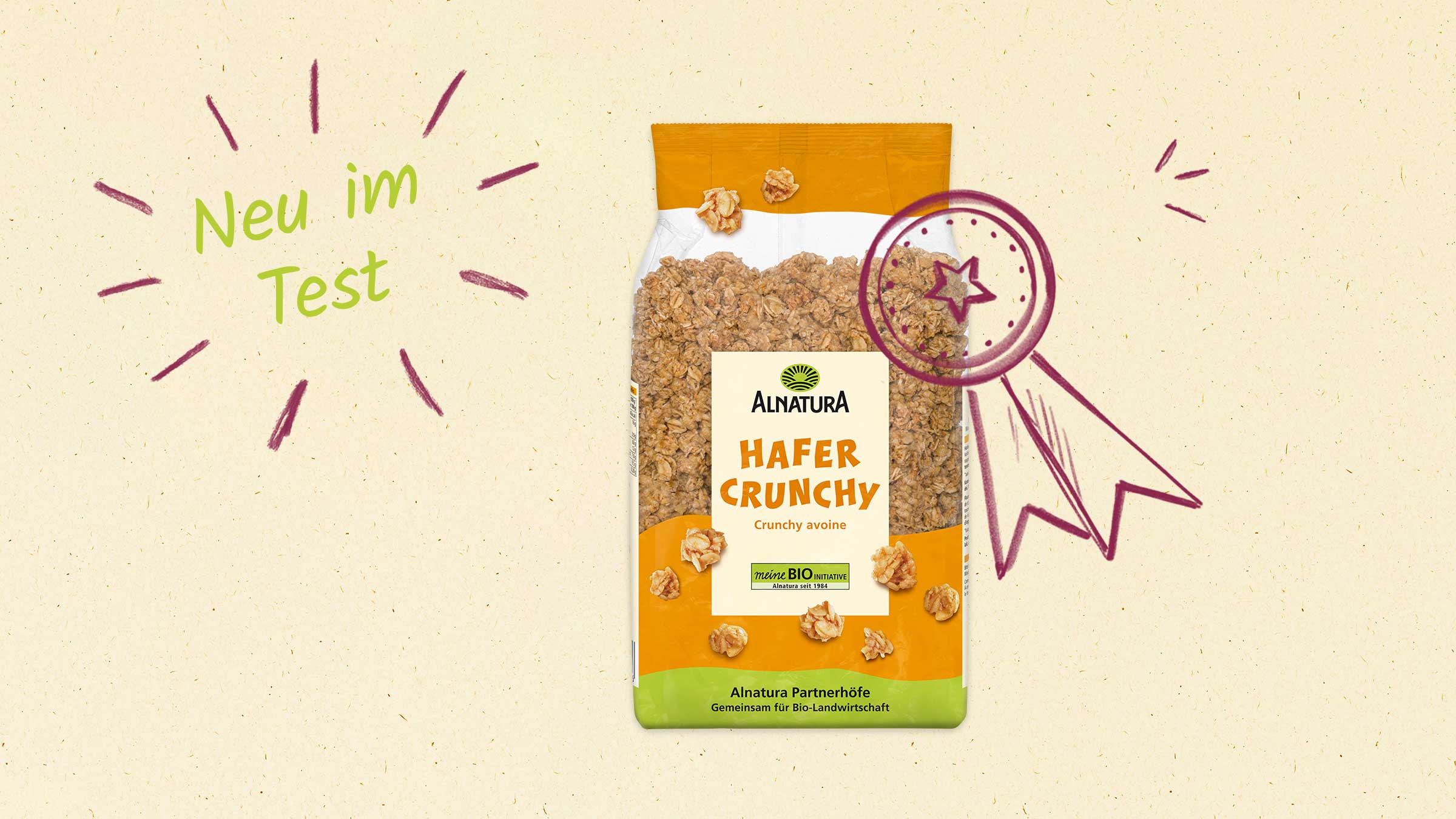 Eine Tüte Alnatura Hafer Crunchy mit einem roten Siegel und der Aufschrift "Neu im Test".