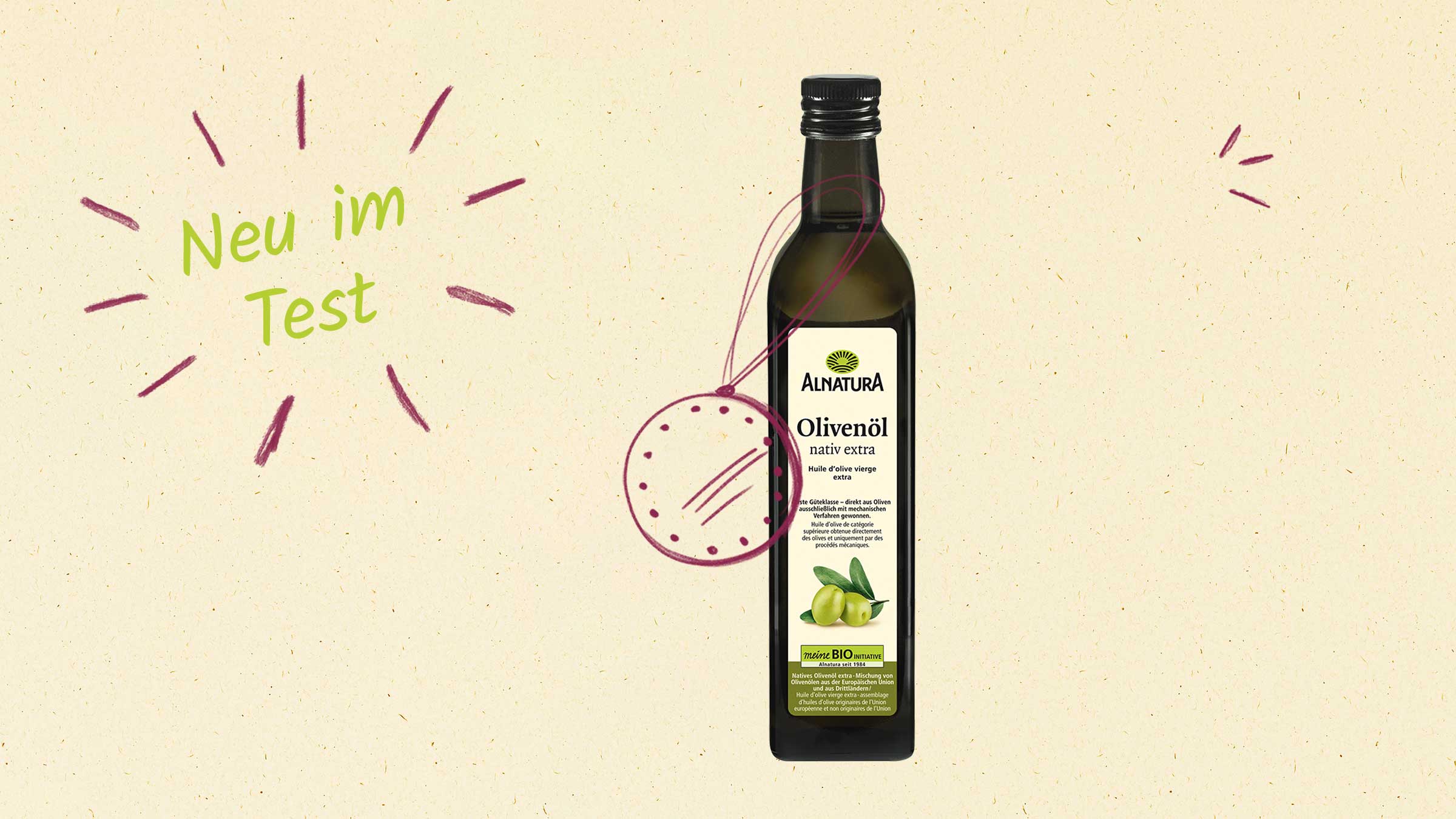 Eine Flasche Alnatura Olivenöl  wird mit einem "Neu im Test"-Badge und einer Plakette präsentiert.