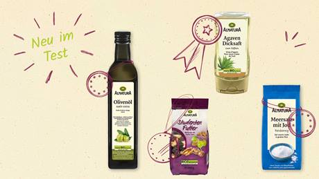 Das Bild zeigt eine Auswahl an Alnatura-Produkten, darunter Studentenfutter, Olivenöl, Agavendicksaft und Meersalz mit Jod. Ein "Neu im Test"-Hinweis ist ebenfalls sichtbar.