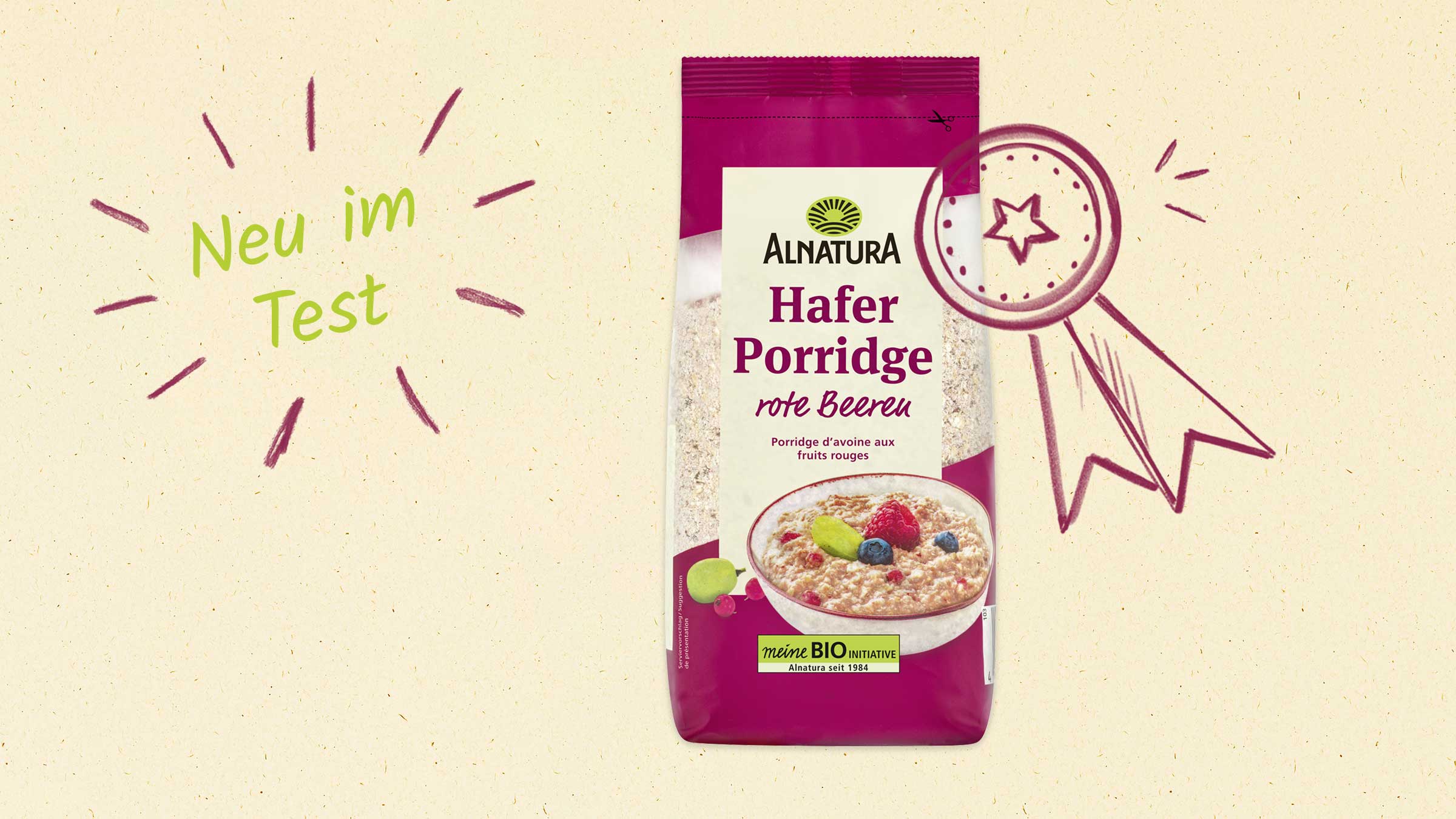Das Bild zeigt eine Packung Alnatura Hafer Porridge mit roten Beeren, beworben als "Neu im Test".