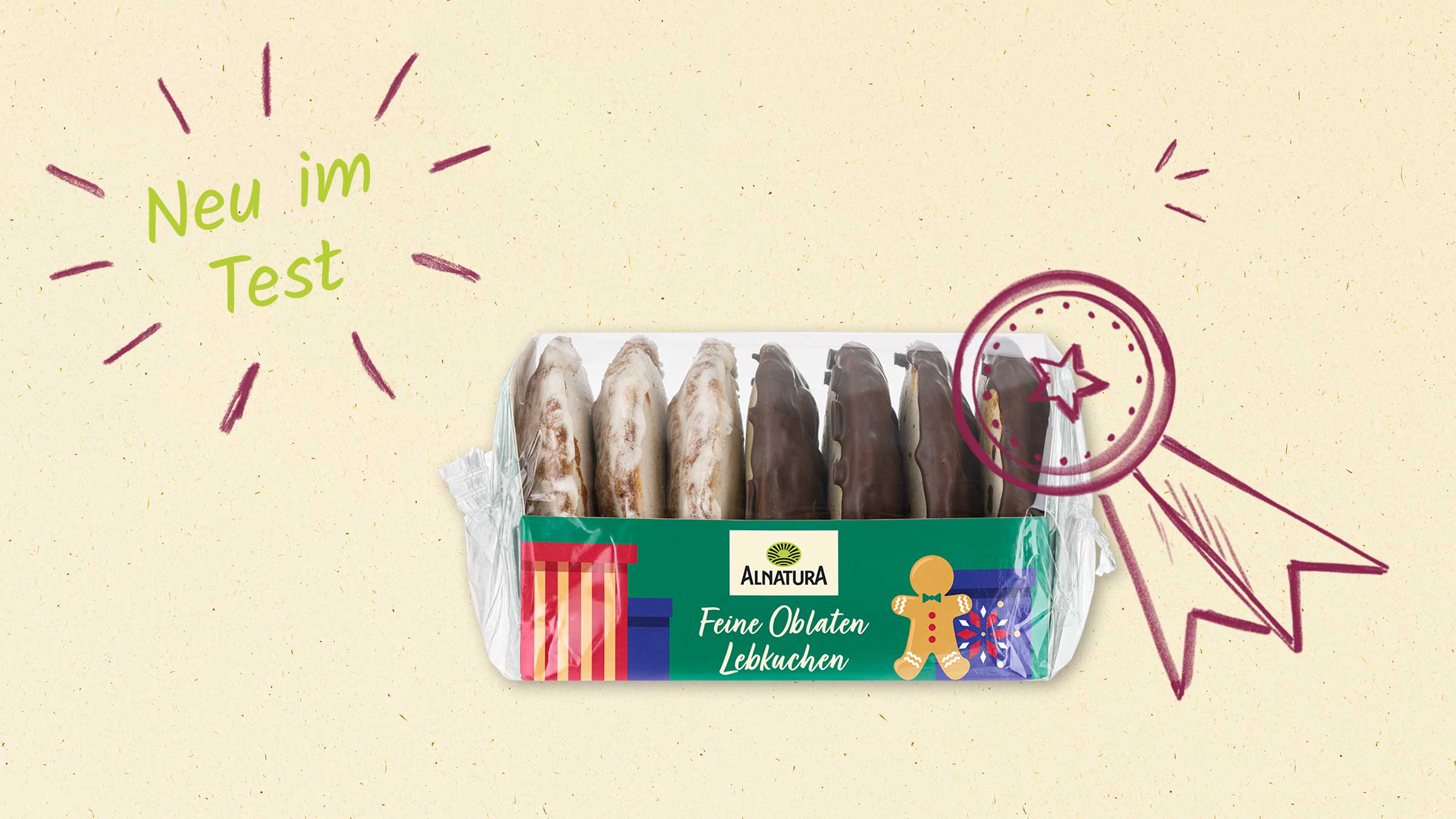 Das Bild zeigt eine Packung "Alnatura Feine Oblaten Lebkuchen" auf einem hellen, strukturierten Hintergrund. Die Lebkuchen sind teils mit Zuckerglasur, teils mit Schokolade überzogen und in einer Plastikverpackung präsentiert. Links im Bild ist ein grüner Schriftzug "Neu im Test" mit umgebenden Strichen in roter Farbe zu sehen. Rechts befindet sich eine gezeichnete Auszeichnung mit einem Stern in der Mitte, ebenfalls in Rot. Die Komposition wirkt einladend und bewirbt die Lebkuchen als neu getestetes Produkt.