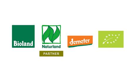 4 Logos: Bioland, Naturland, Demeter und EU-Biosiegela