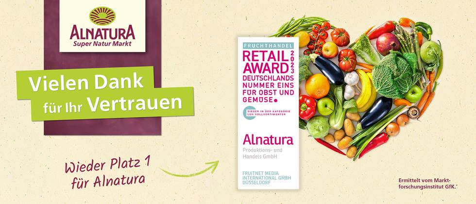 Herz geformt aus Obst und Gemüse, darüber ein Logo mit der Auszeichnung für Alnatura "Fruchthandel Retail Award 2023 – Deutschlands Nummer Eins für Obst und Gemüse"