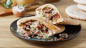 Pitataschen mit Sauerkraut und Speck
